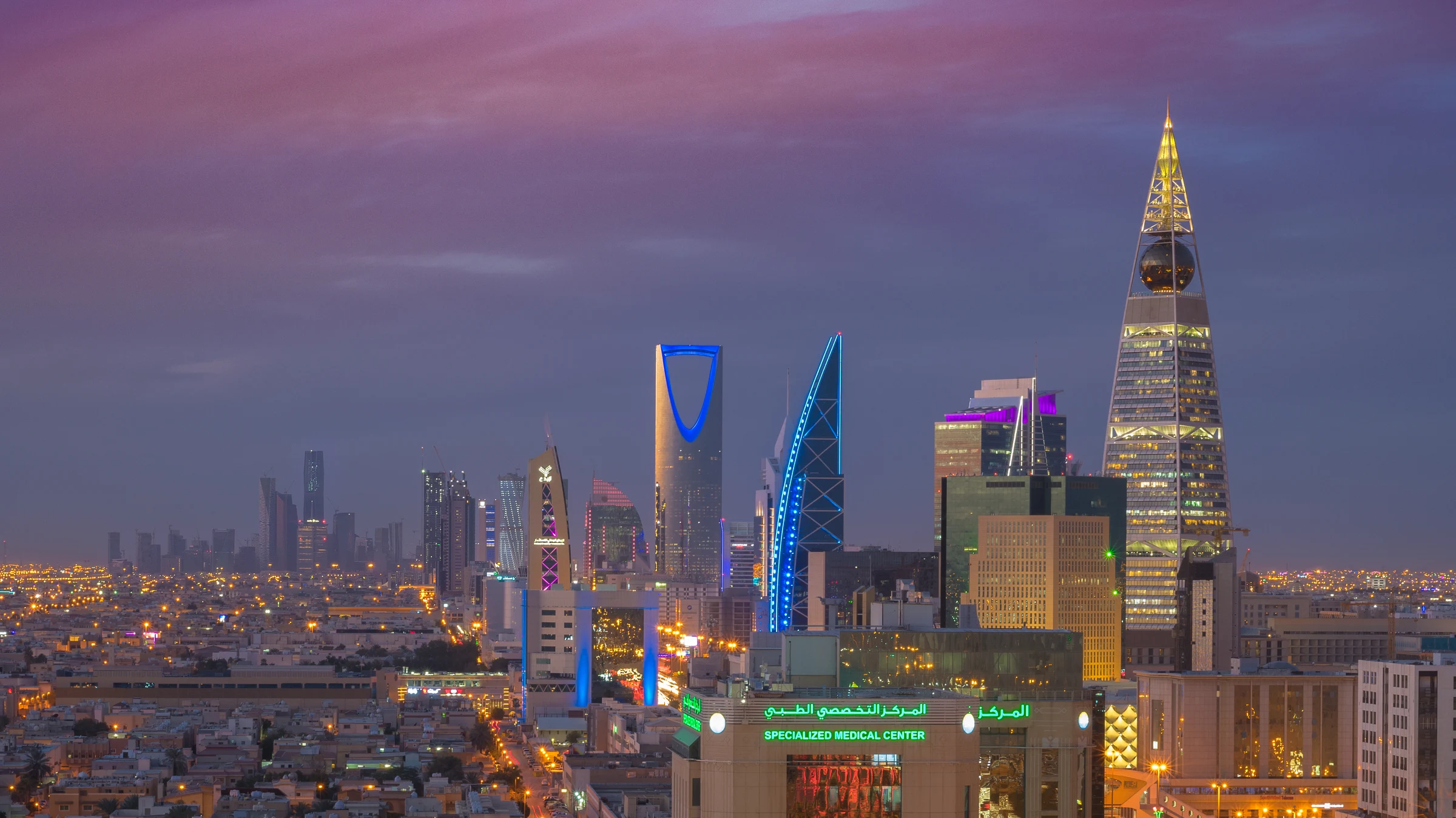 Riyadh skyline at dusk, with Kingdom Centre and Al Faisaliyah Tower